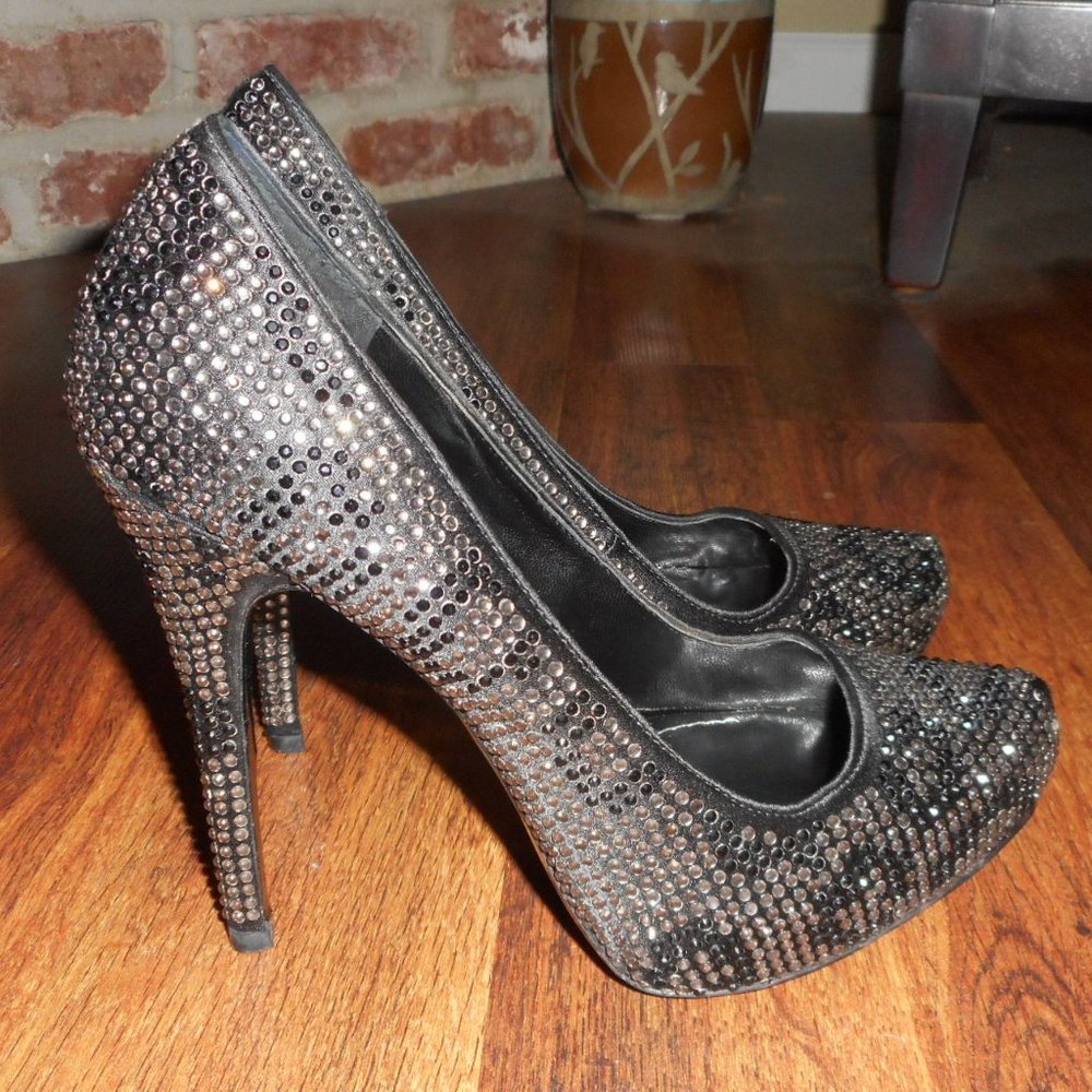 Report Signature Black leopard print jeweled pumps, 7.5